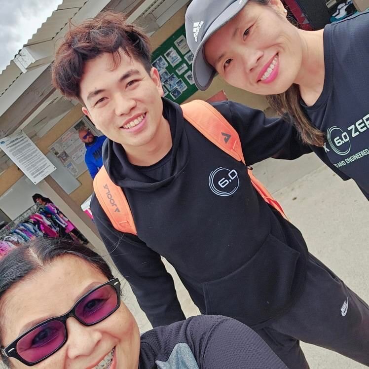 Players smiling together during a community tournament