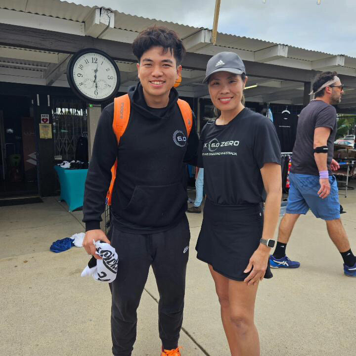 Eric Ng connecting with a fellow player at a pickleball event