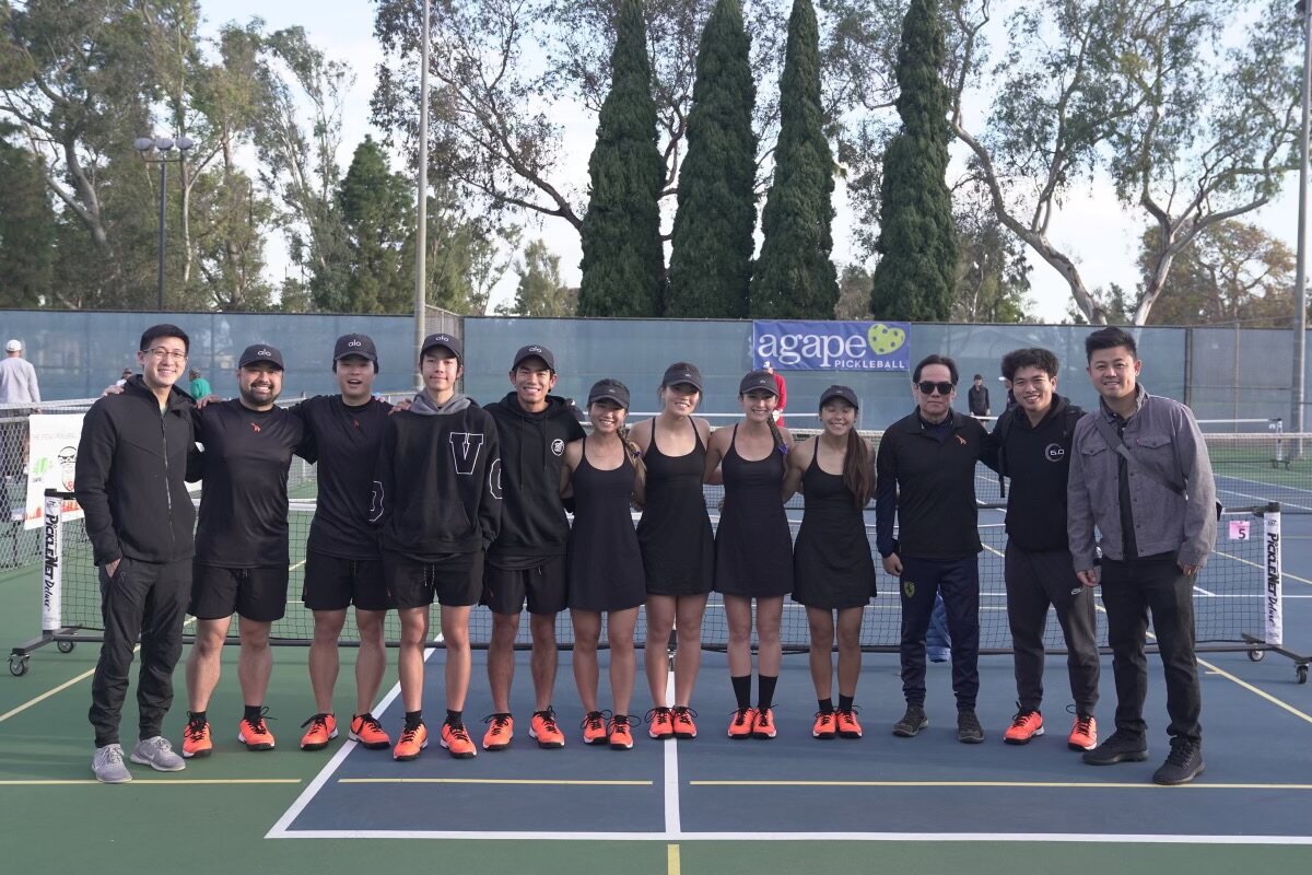 NGSG competitive athletes and supporters standing together on court