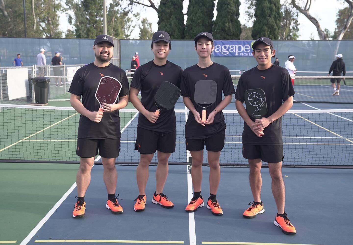 NGSG competitive team standing together on a pickleball court