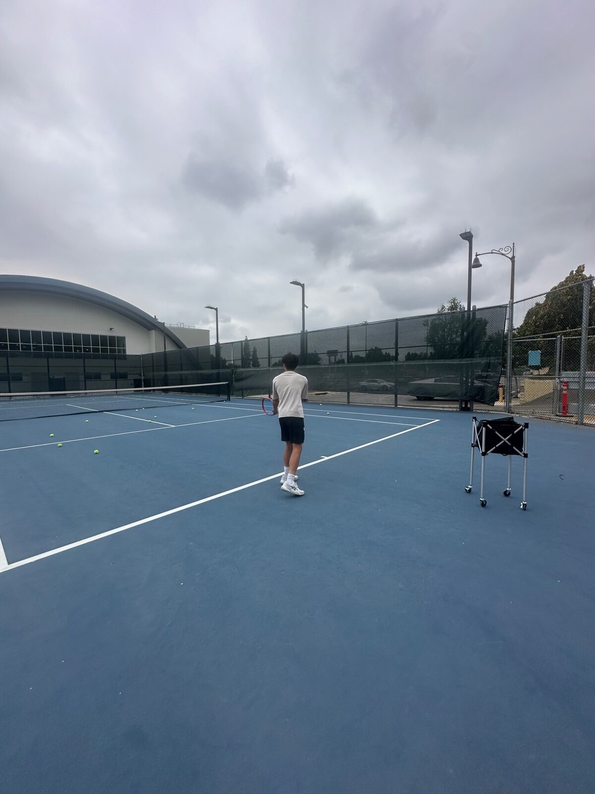 One-on-one athlete training on a community court