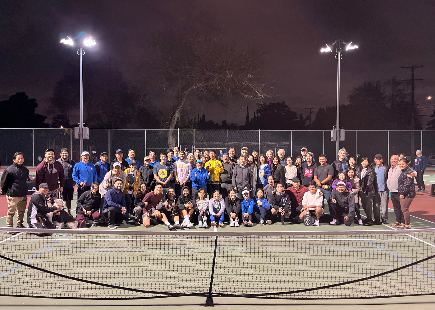 NGSG community gathered together on a court